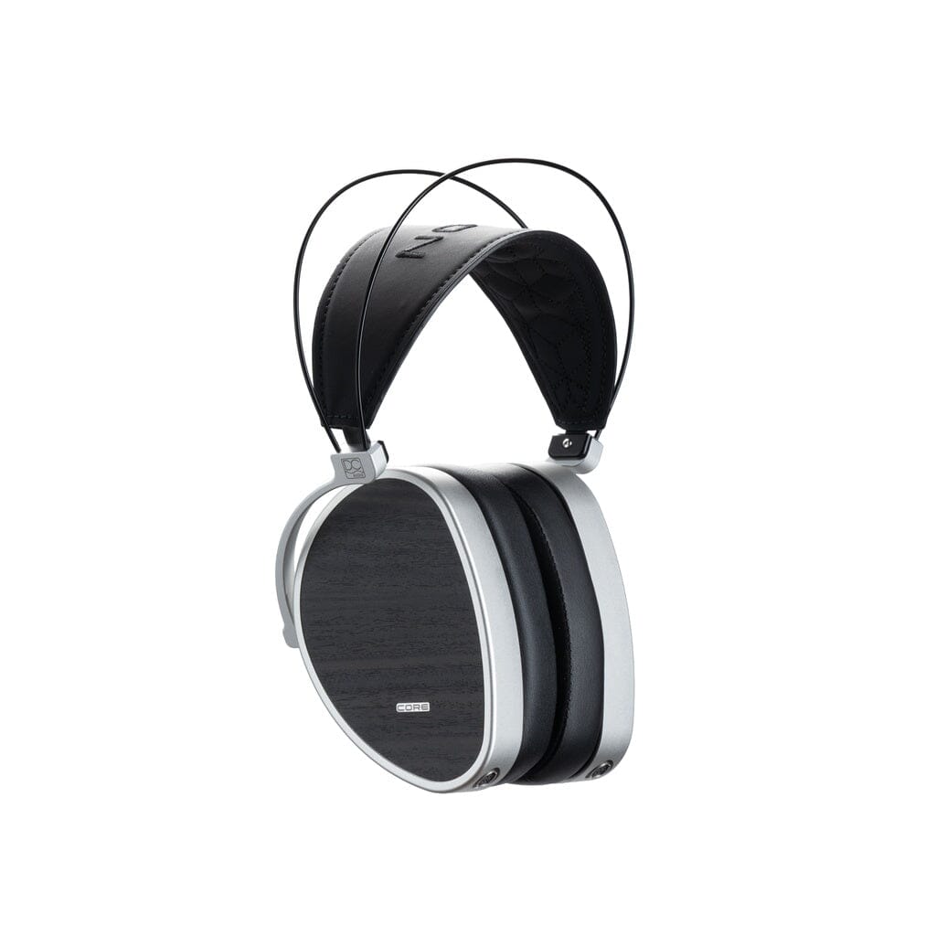 Dan Clark Audio AEON Core, three-quarter view showing wood-textured ear cups and titanium headband